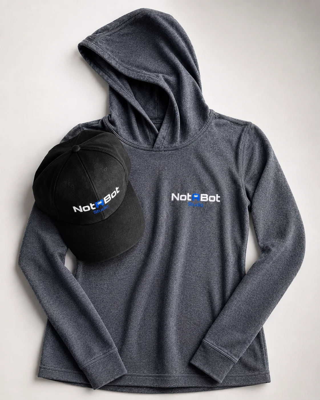 Black Notabot Studio cap with graphite performance hoodie